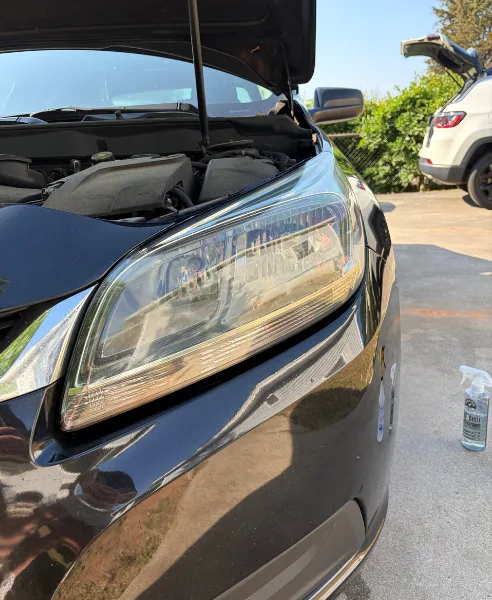 Black SUV headlight, our own work, after restoration