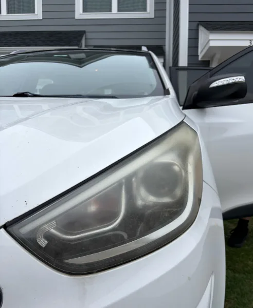 White Hyundai Tucson headlight, our own work, before restoration