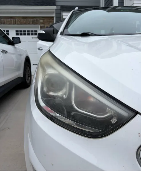 White Hyundai Tucson headlight, our own work, before restoration