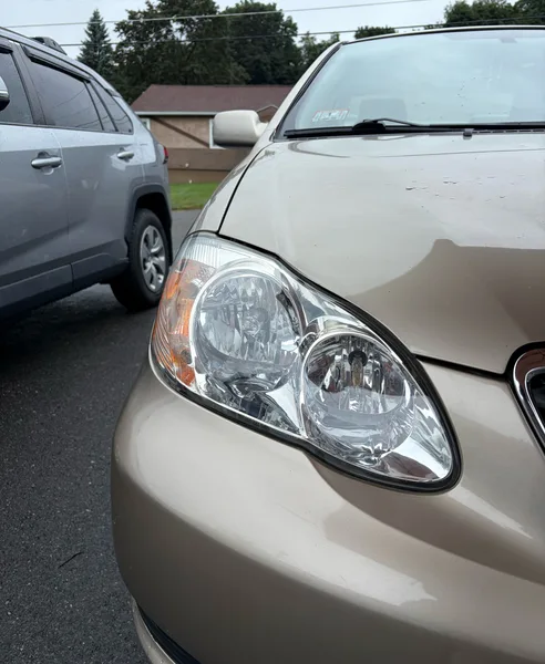 Toyota Corolla headlight in Fitchburg, Massachusetts, after restoration