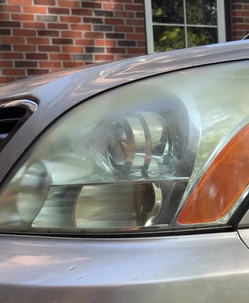 Lexus headlight in North Leominster, Massachusetts, before restoration