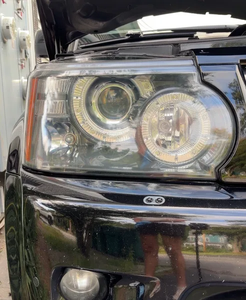 Range Rover headlight in Stow, Massachusetts, after restoration